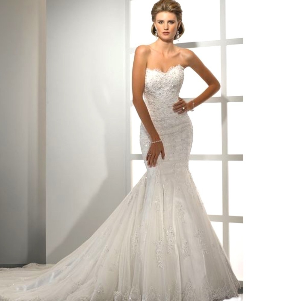 Reduced Sottero and Midgley strapless wedding gown Size 10petite.